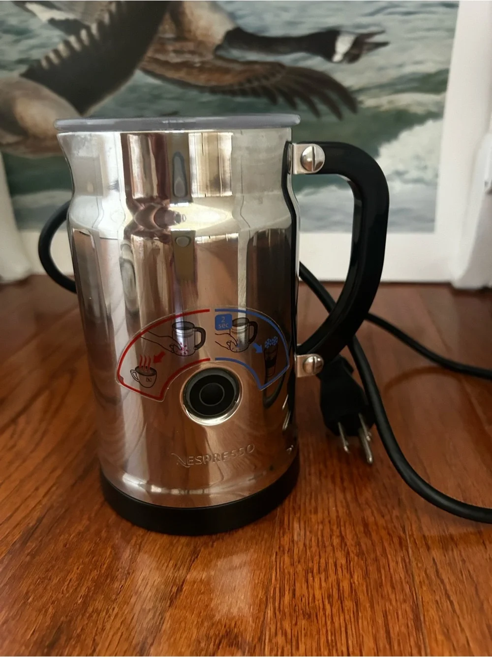 Nespresso Stainless Steel Milk Frother with Black Handle and Red/Blue Icons
